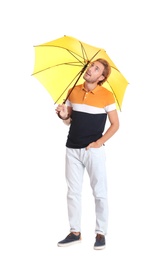 Photo of Man with yellow umbrella on white background