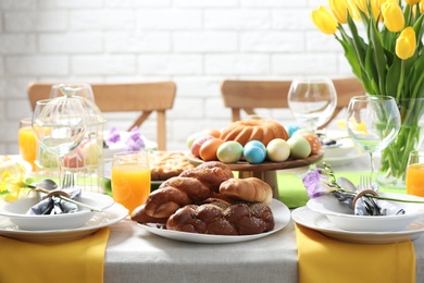 Festive Easter table setting with traditional meal at home