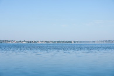 Picturesque view of calm river under blue sky