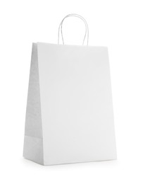 Photo of Blank paper bag on white background. Space for design