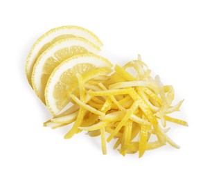 Photo of Pieces of lemon peel and slices of fresh fruit on white background, top view. Citrus zest