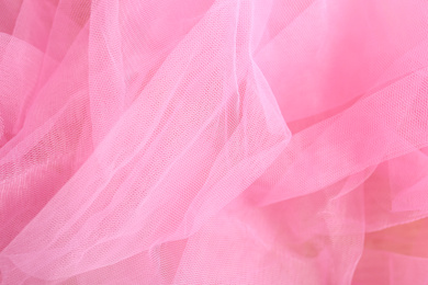 Texture of beautiful pink fabric as background, closeup