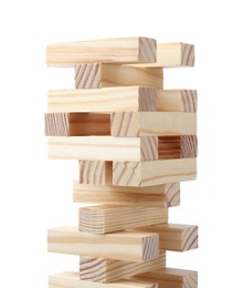 Jenga tower made of wooden blocks on white background