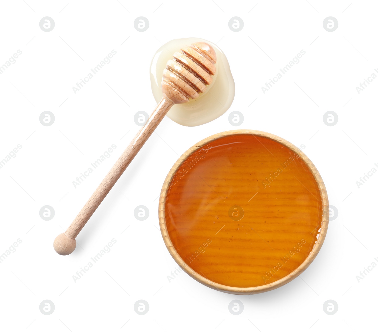 Photo of Tasty honey in bowl and dipper isolated on white, top view