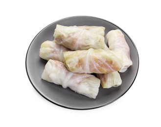 Photo of Plate with uncooked stuffed cabbage rolls isolated on white