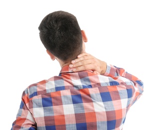 Photo of Young man suffering from neck pain on white background