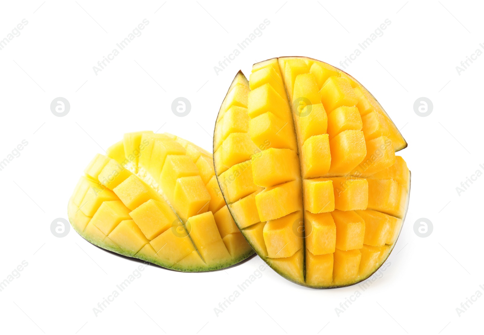 Photo of Fresh juicy mango halves isolated on white