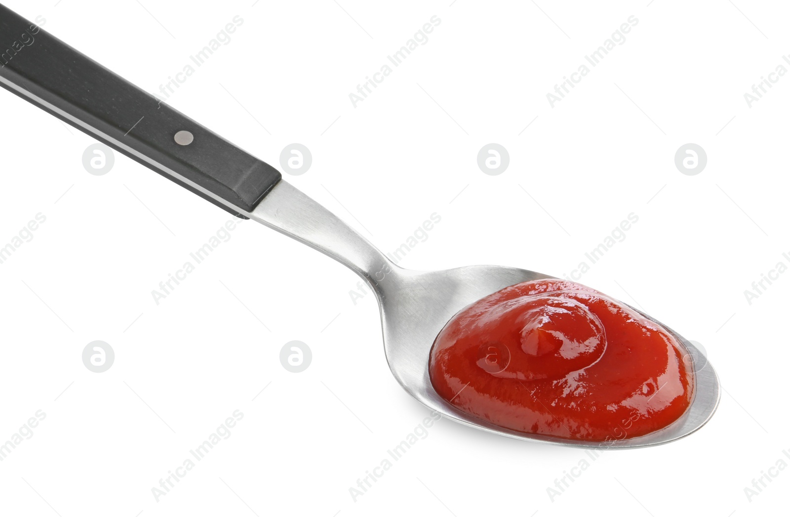 Photo of Tasty ketchup with spoon isolated on white. Tomato sauce