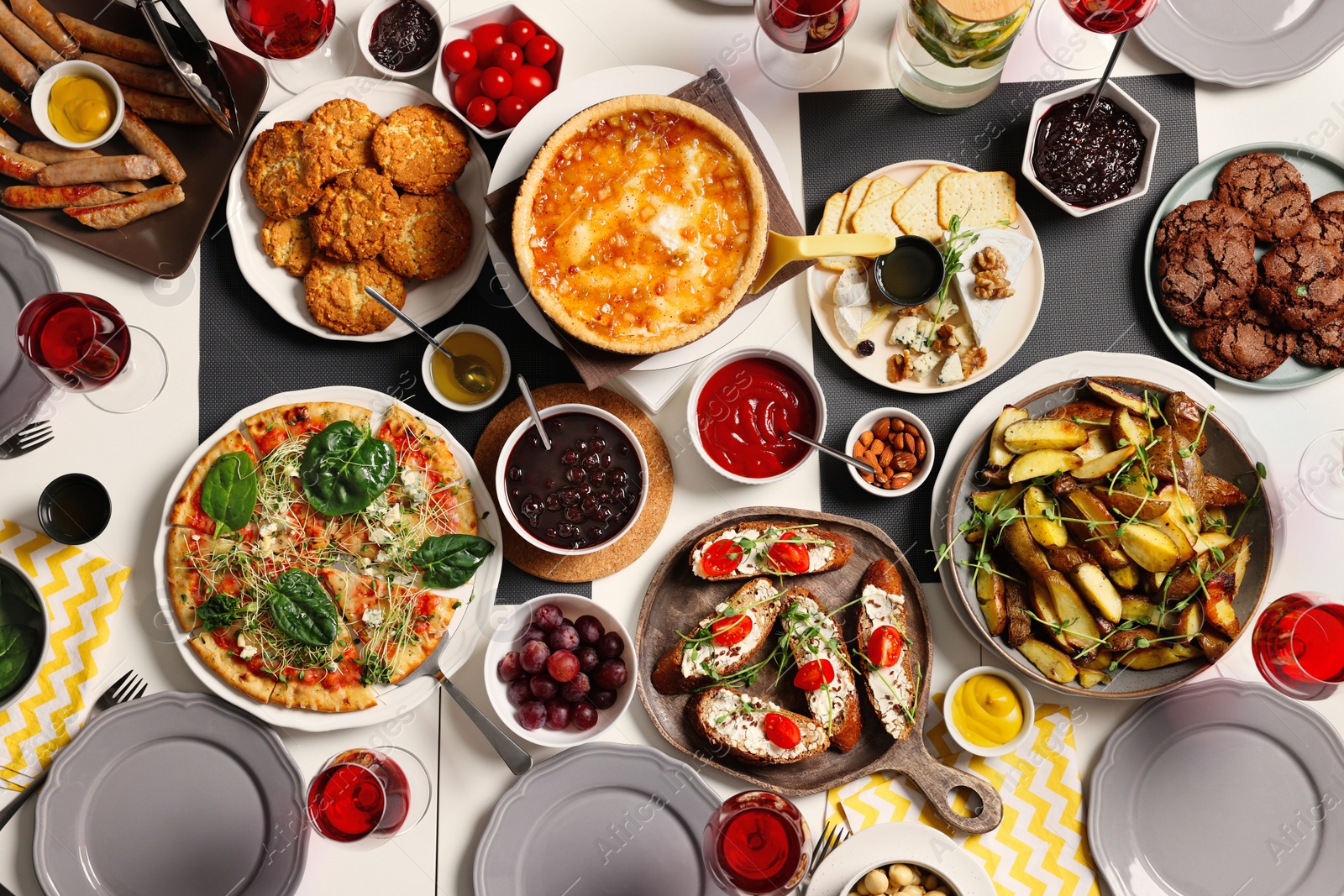 Photo of Brunch table setting with different delicious food, flat lay