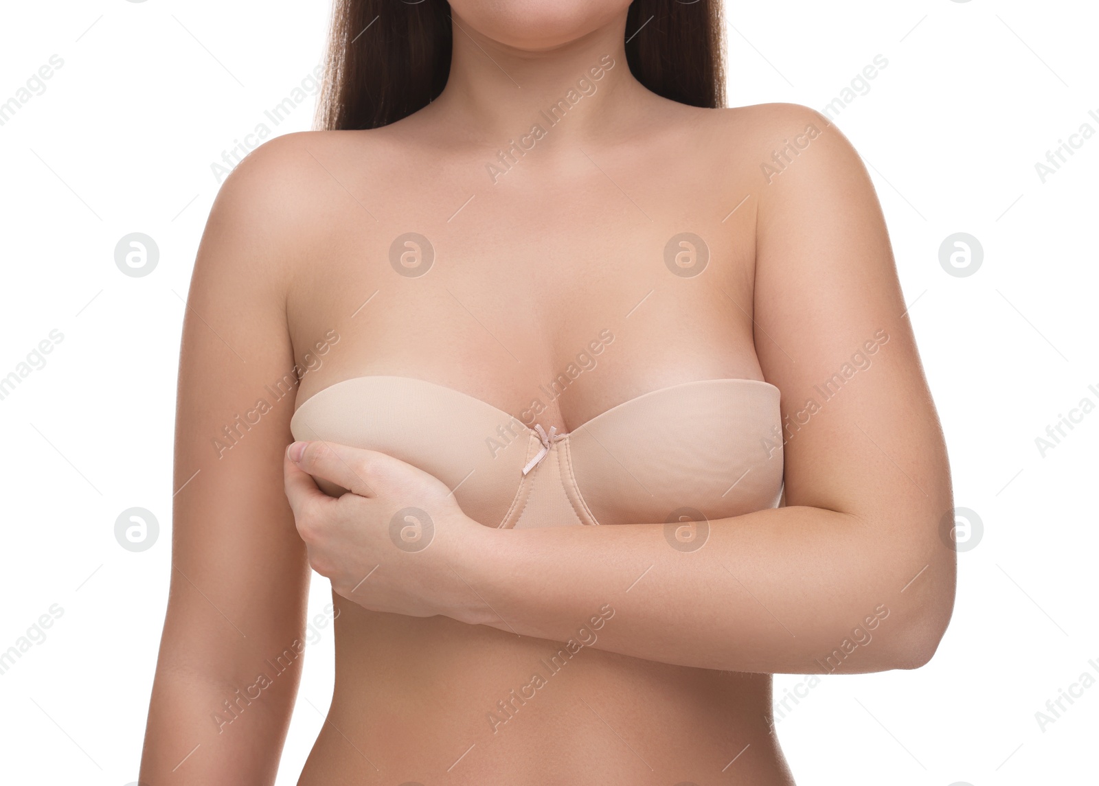 Photo of Mammology. Woman in bra doing breast self-examination on white background, closeup