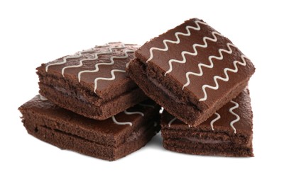 Photo of Delicious chocolate sponge cakes isolated on white