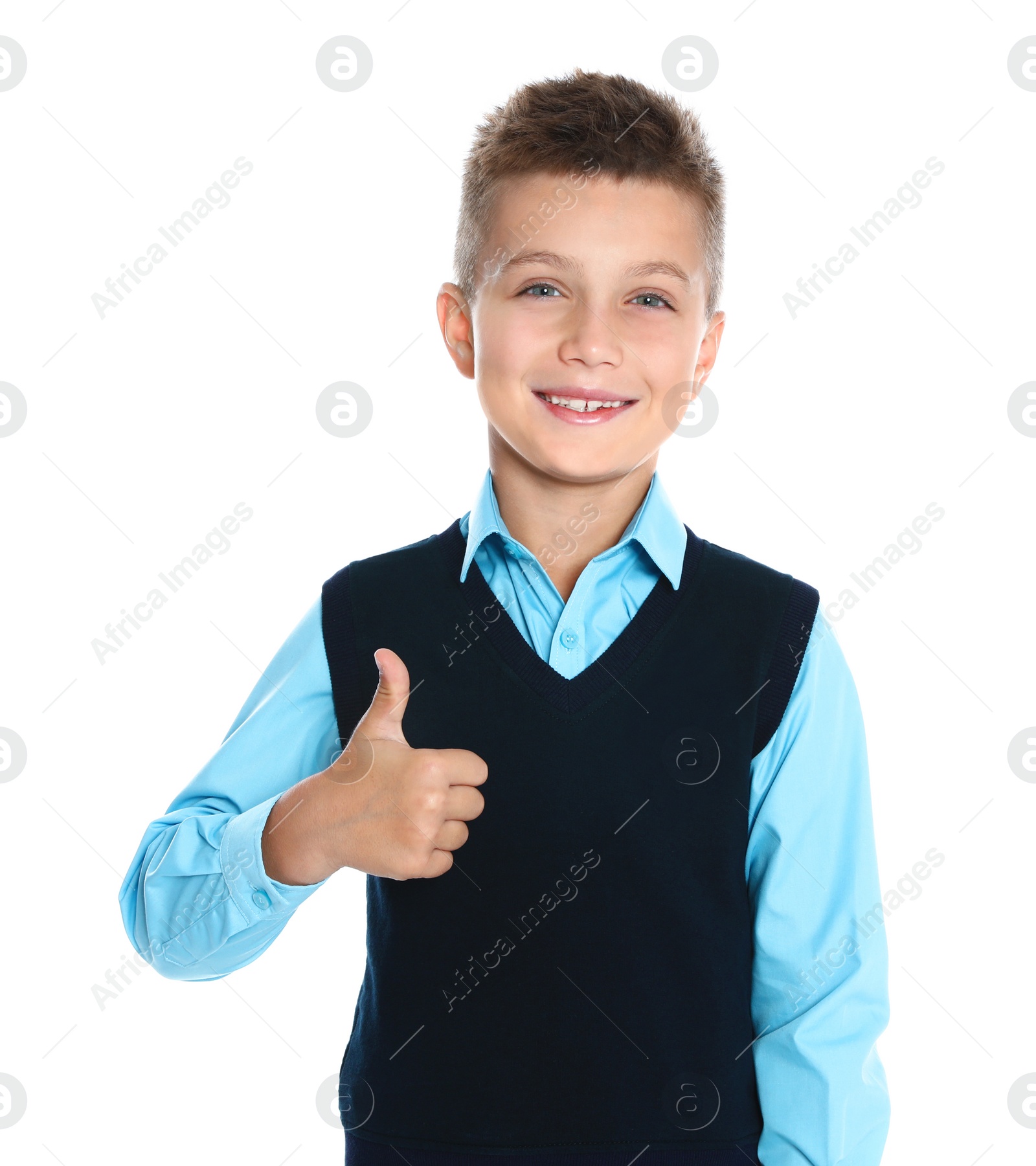 Photo of Happy boy in school uniform on white background