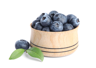 Fresh ripe blueberries in bowl on white background