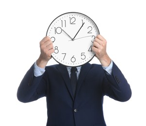 Businessman holding clock on white background. Time management