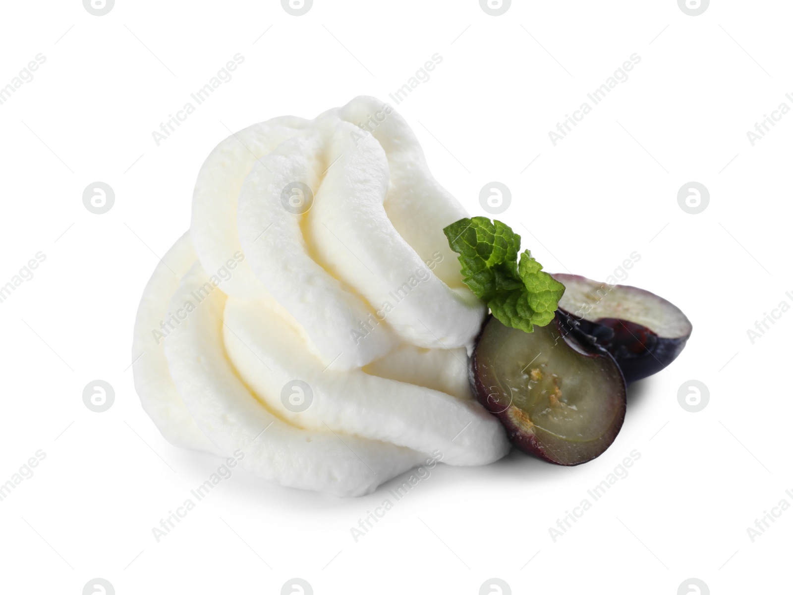 Photo of Delicious fresh whipped cream swirl with blueberries and mint isolated on white