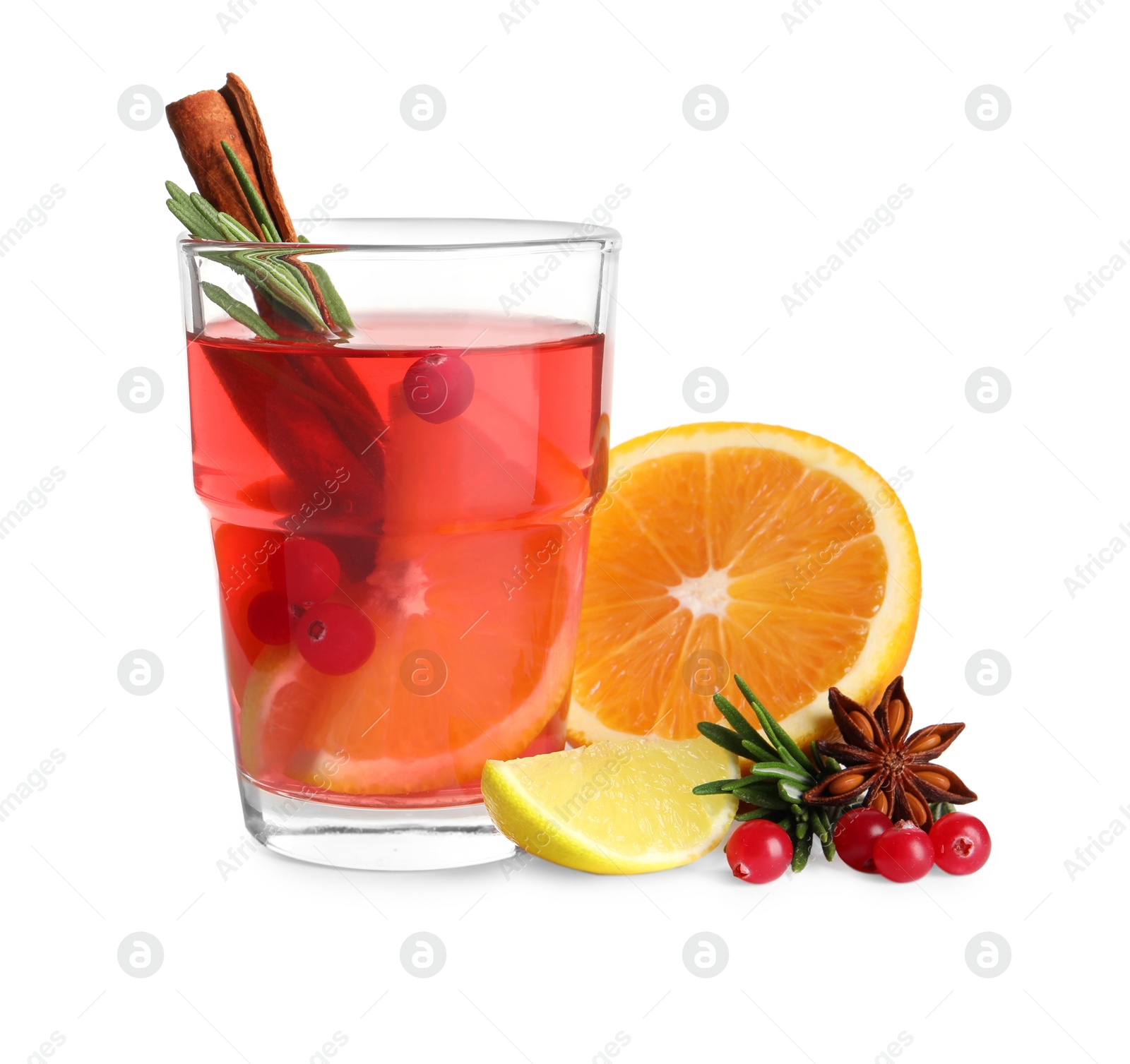 Photo of Glass of aromatic punch drink and ingredients on white background