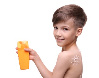 Happy boy holding bottle of sun protection cream on white background