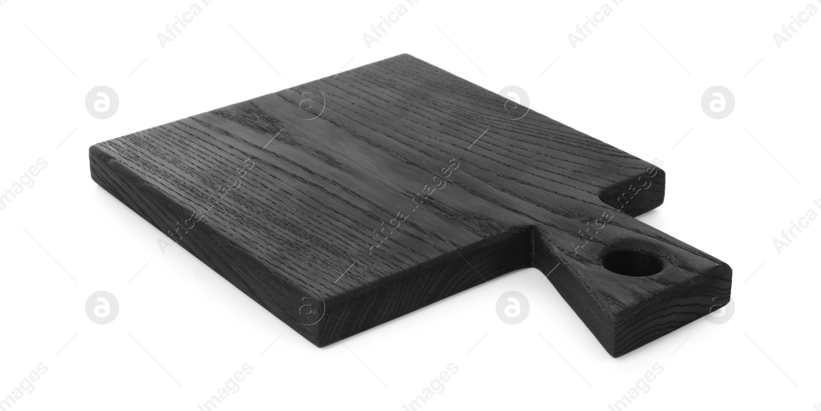 Photo of Black wooden cutting board isolated on white