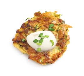 Photo of Delicious zucchini fritter with sour cream and onion isolated on white, top view