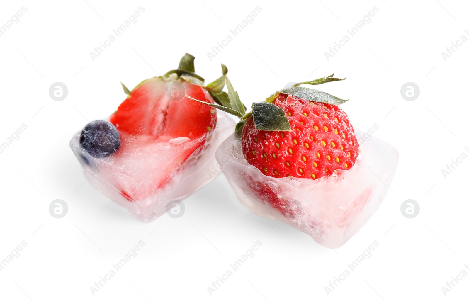 Photo of Ice cubes with berries on white background