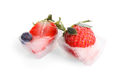 Photo of Ice cubes with berries on white background