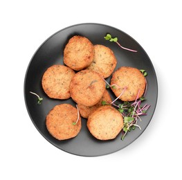Photo of Platedelicious vegan cutlets and microgreens isolated on white, top view