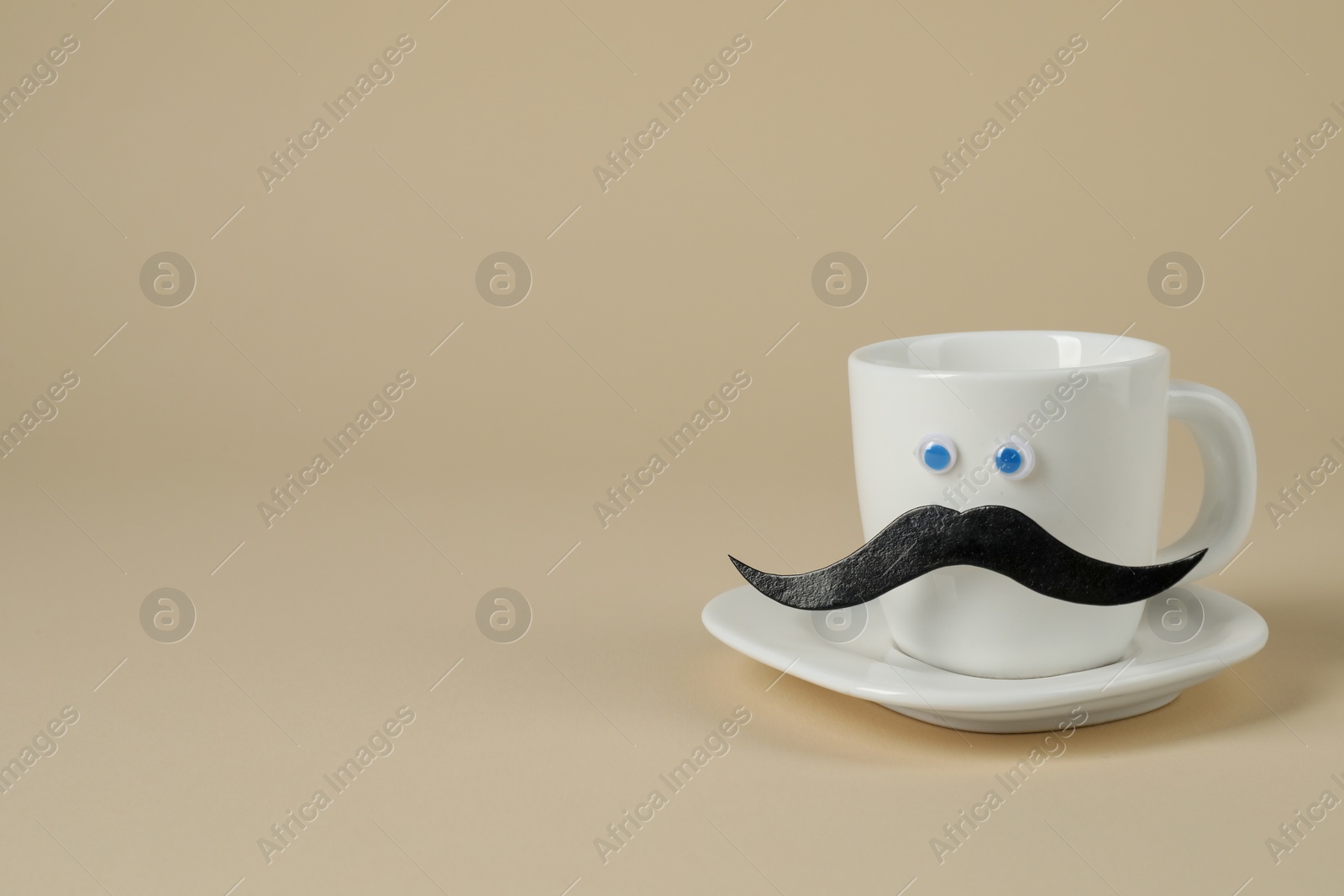 Photo of Man's face made of fake mustache, cup and eyes on beige background, space for text