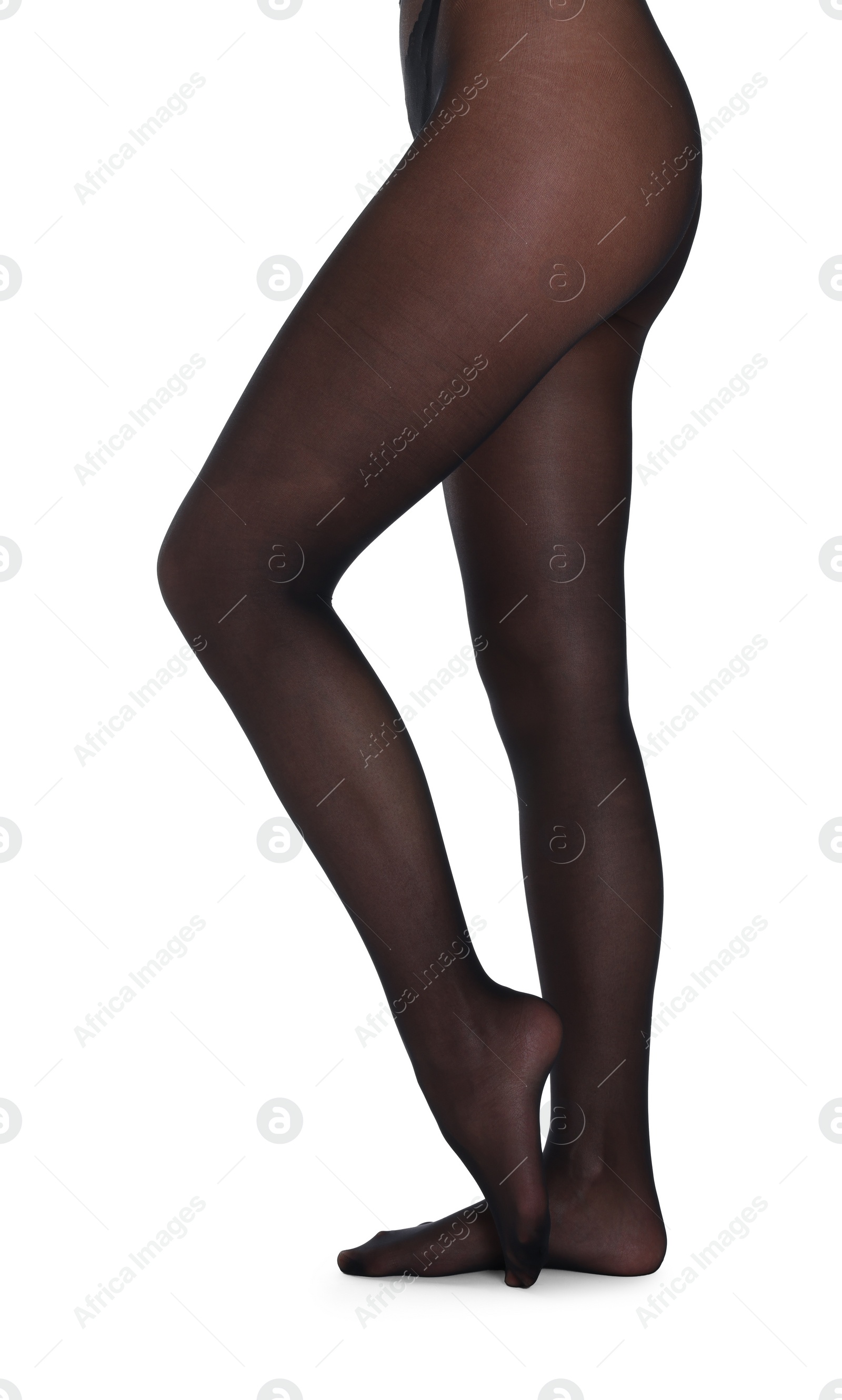 Photo of Woman with beautiful long legs wearing black tights on white background, closeup