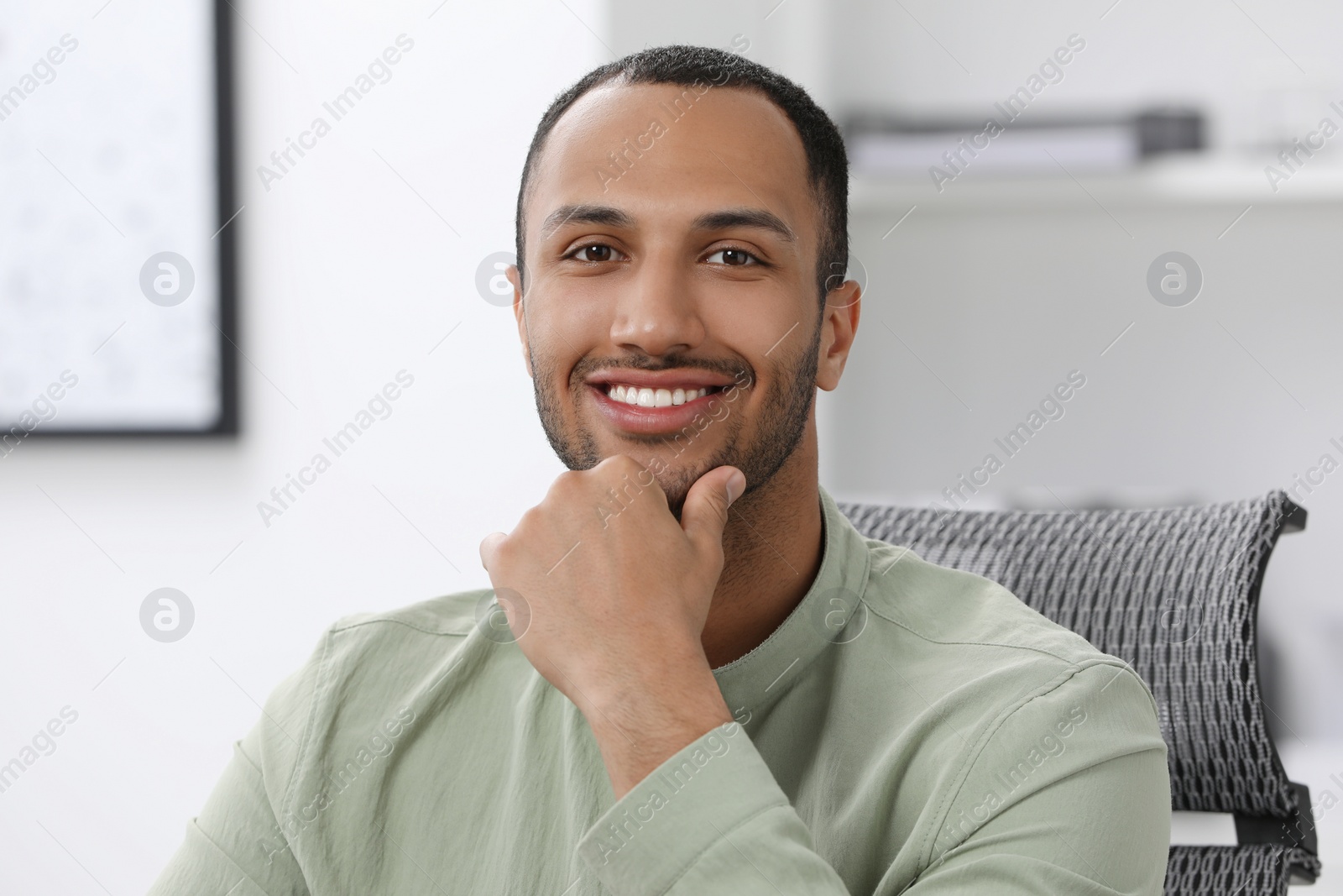 Photo of Portrait of handsome young man at home