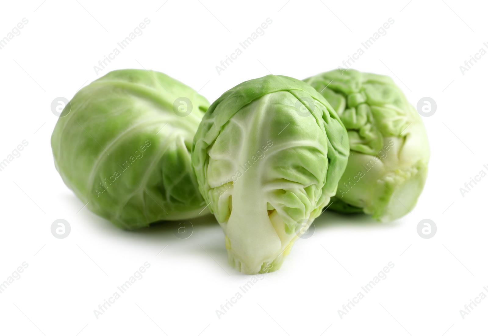 Photo of Tasty fresh Brussels sprouts isolated on white