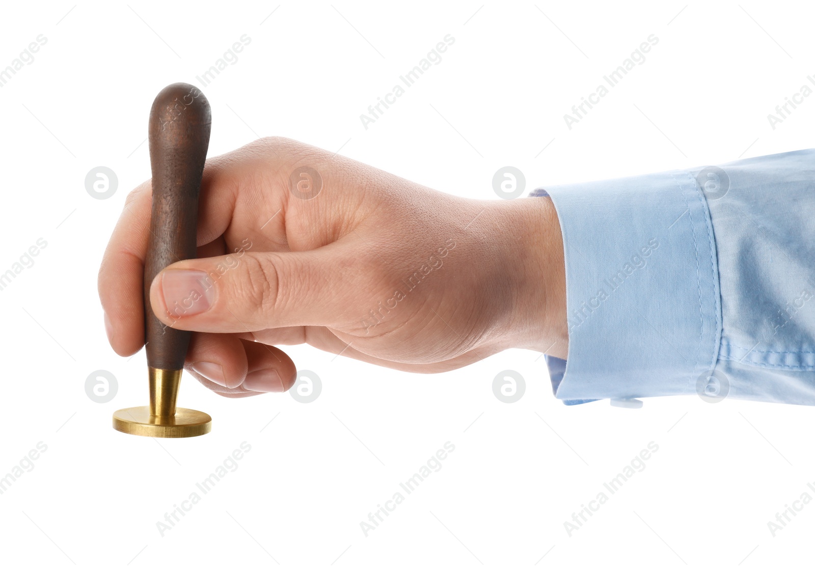 Photo of Man holding wooden stamp on white background, closeup