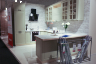 Blurred view of kitchen interior with modern furniture