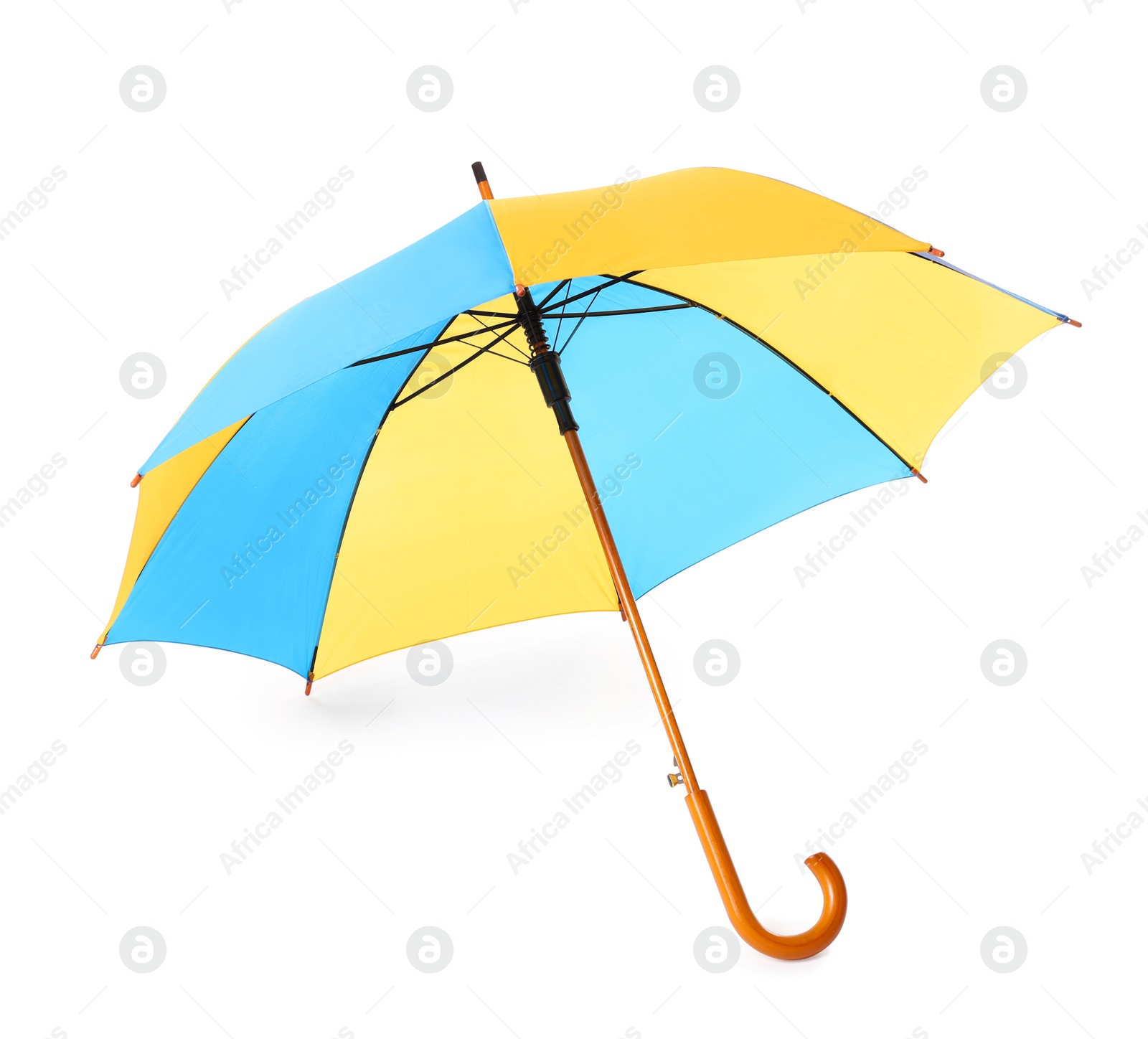 Photo of Modern opened bright umbrella isolated on white