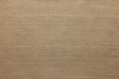 Texture of burlap fabric as background, top view