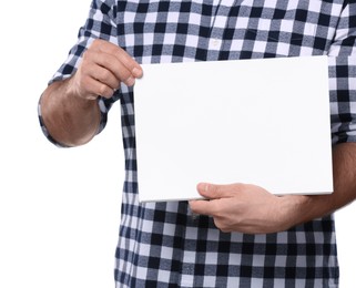 Photo of Man holding sheet of paper on light grey background, closeup. Mockup for design
