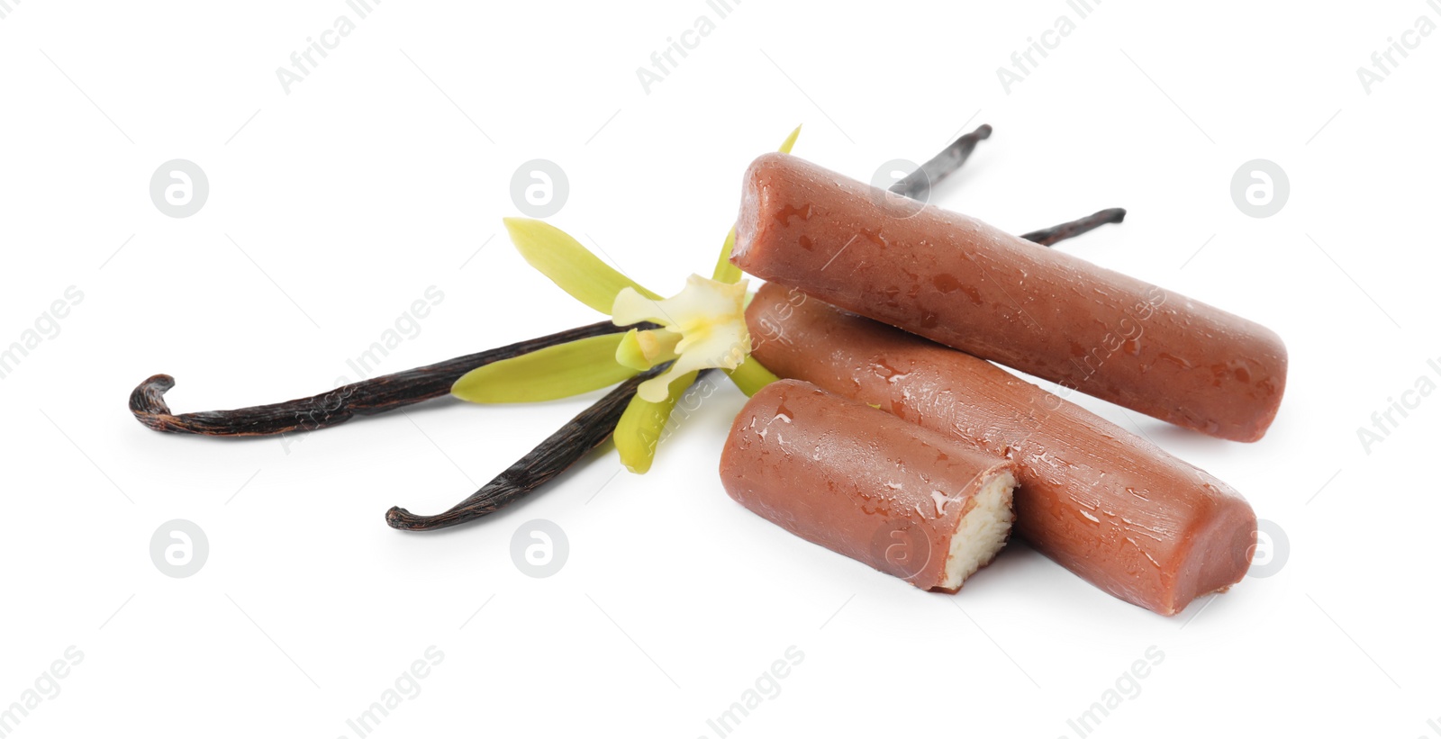 Photo of Glazed curd cheese bars, vanilla pods and flower isolated on white