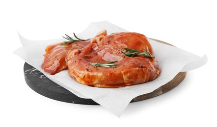 Photo of Board with raw marinated meat and rosemary isolated on white