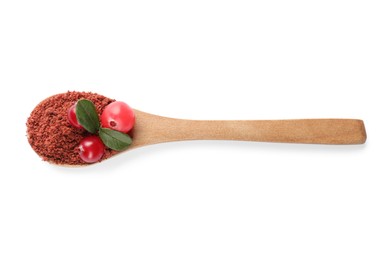 Photo of Wooden spoon with dried cranberry powder, fresh berries and green leaves isolated on white, top view