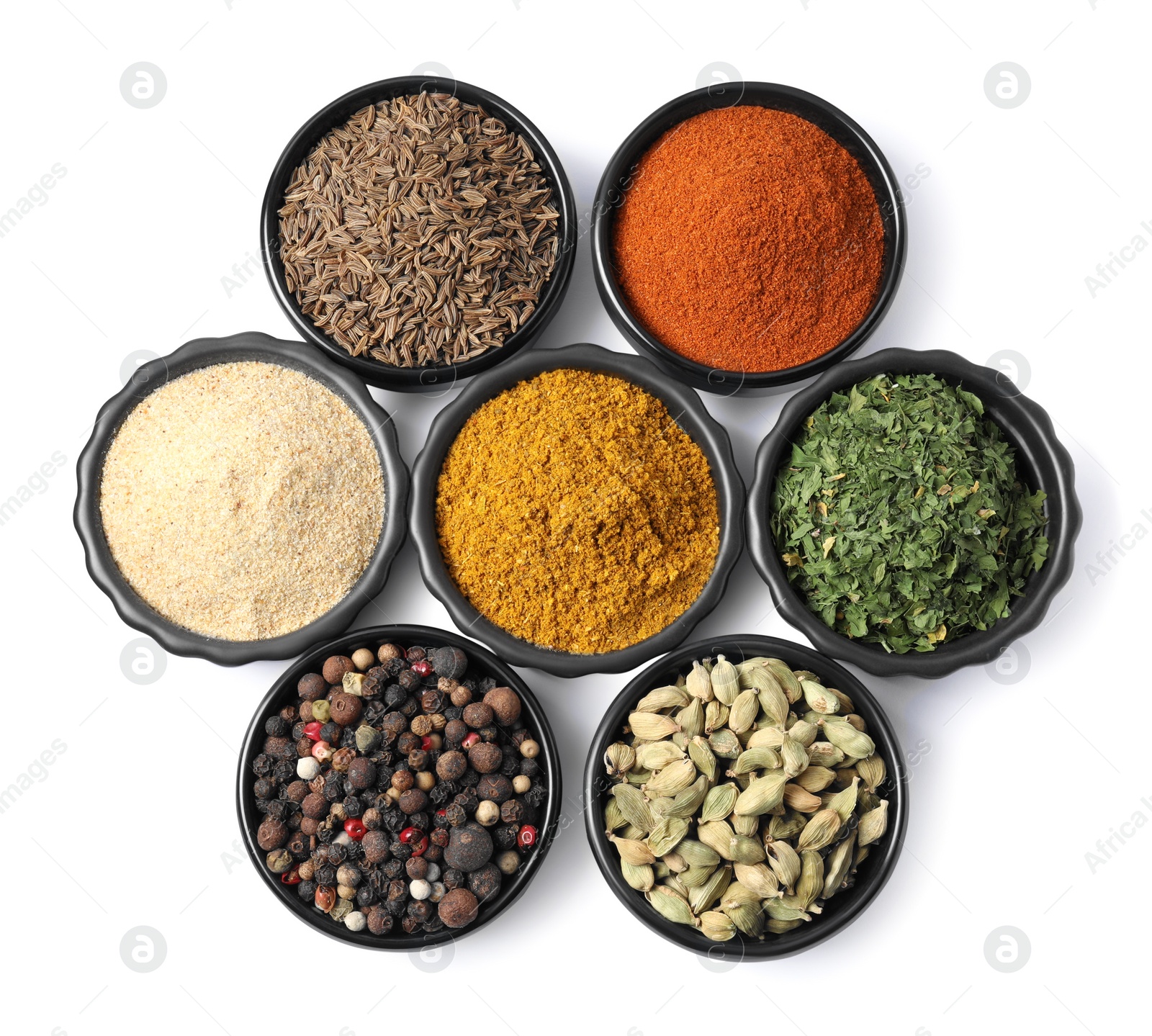 Photo of Bowls with different spices on white background, top view