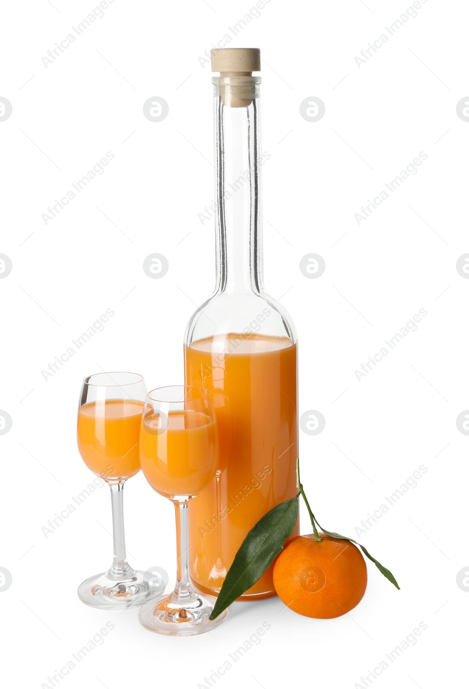Photo of Tasty tangerine liqueur and fresh fruit isolated on white