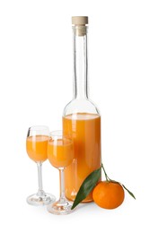 Tasty tangerine liqueur and fresh fruit isolated on white