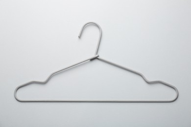 Photo of Hanger on light gray background, top view