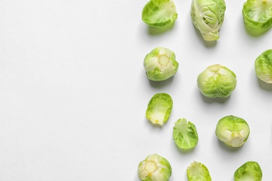 Photo of Tasty fresh Brussels sprouts on white background, top view