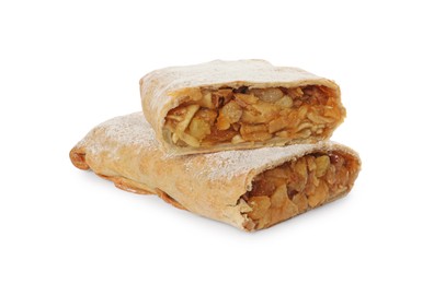 Photo of Delicious cut strudel with apples, nuts and raisins isolated on white