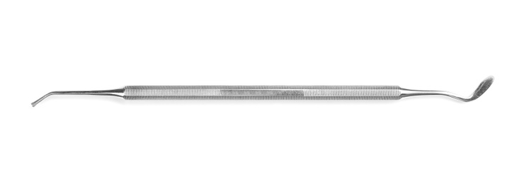 Dental instrument on white background, top view. Medical tool