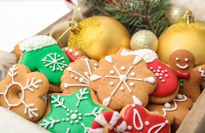 Photo of Crate with tasty homemade Christmas cookies, closeup