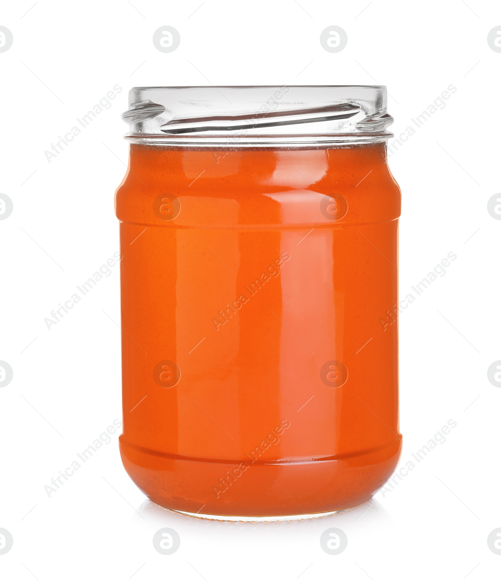 Photo of Jar of organic honey isolated on white