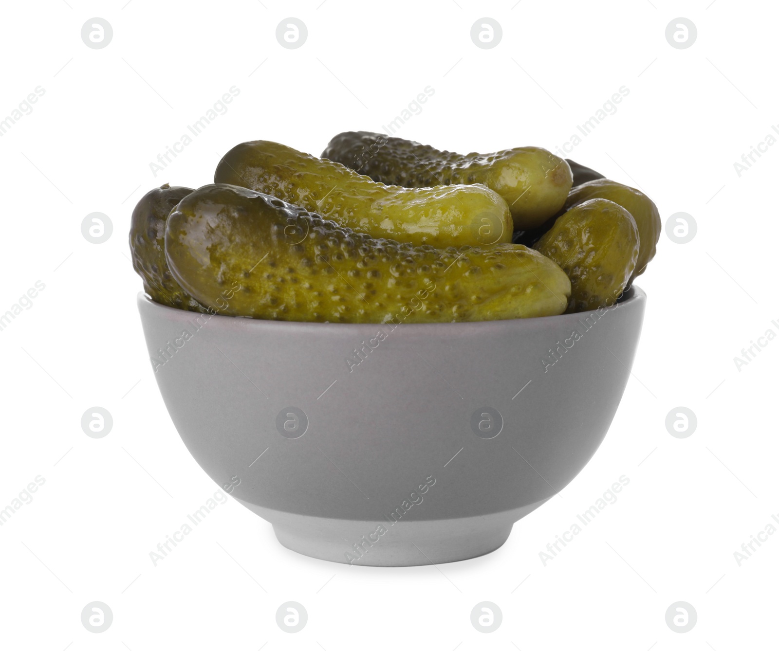 Photo of Bowl of tasty pickled cucumbers isolated on white