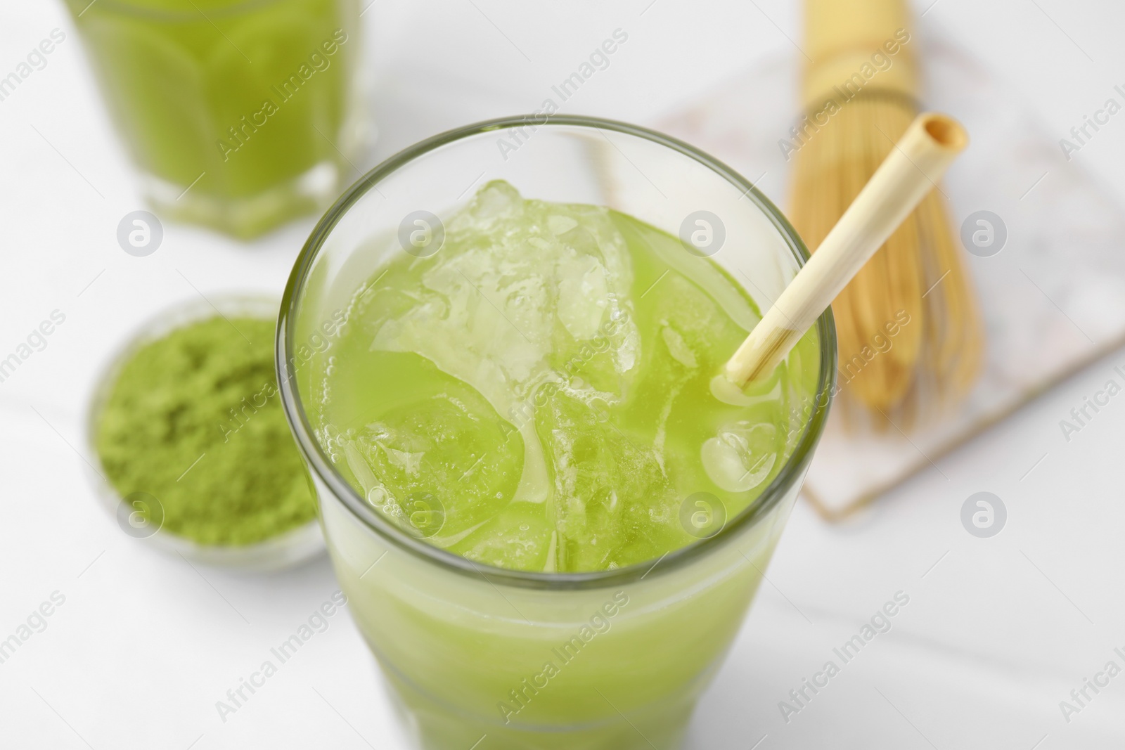 Photo of Glass of delicious iced green matcha tea, above view