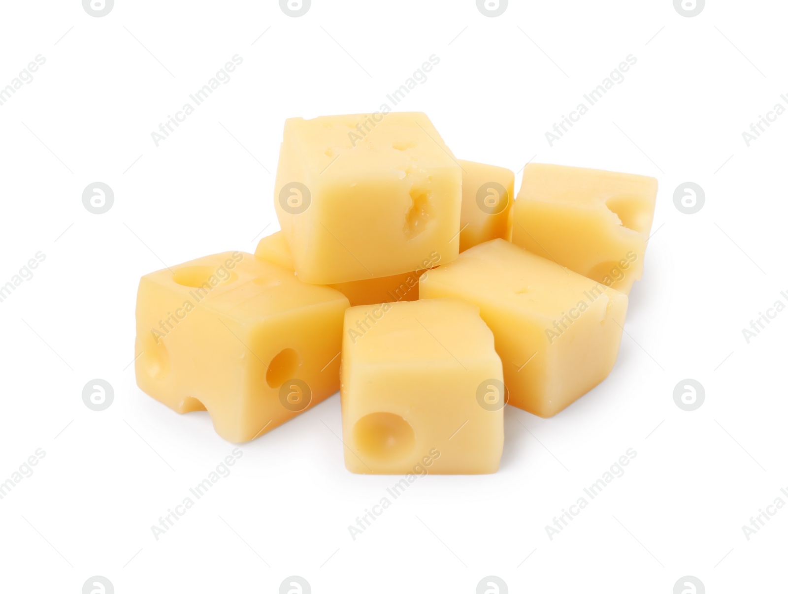 Photo of Cubes of delicious cheese isolated on white